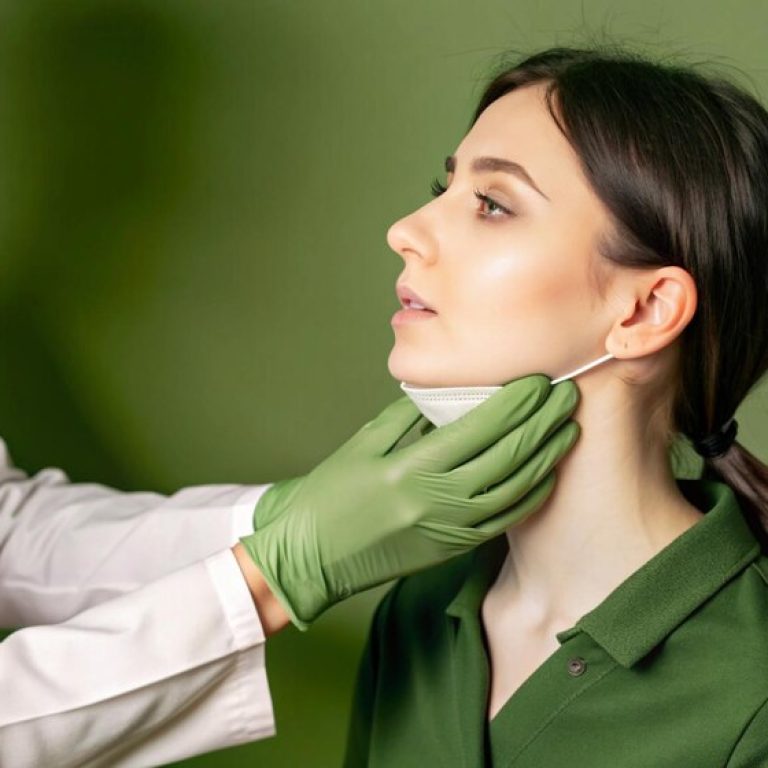 hand-touching-throat-patient_146105-56143