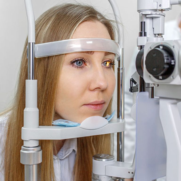 young-woman-slit-lamp-eye-exam